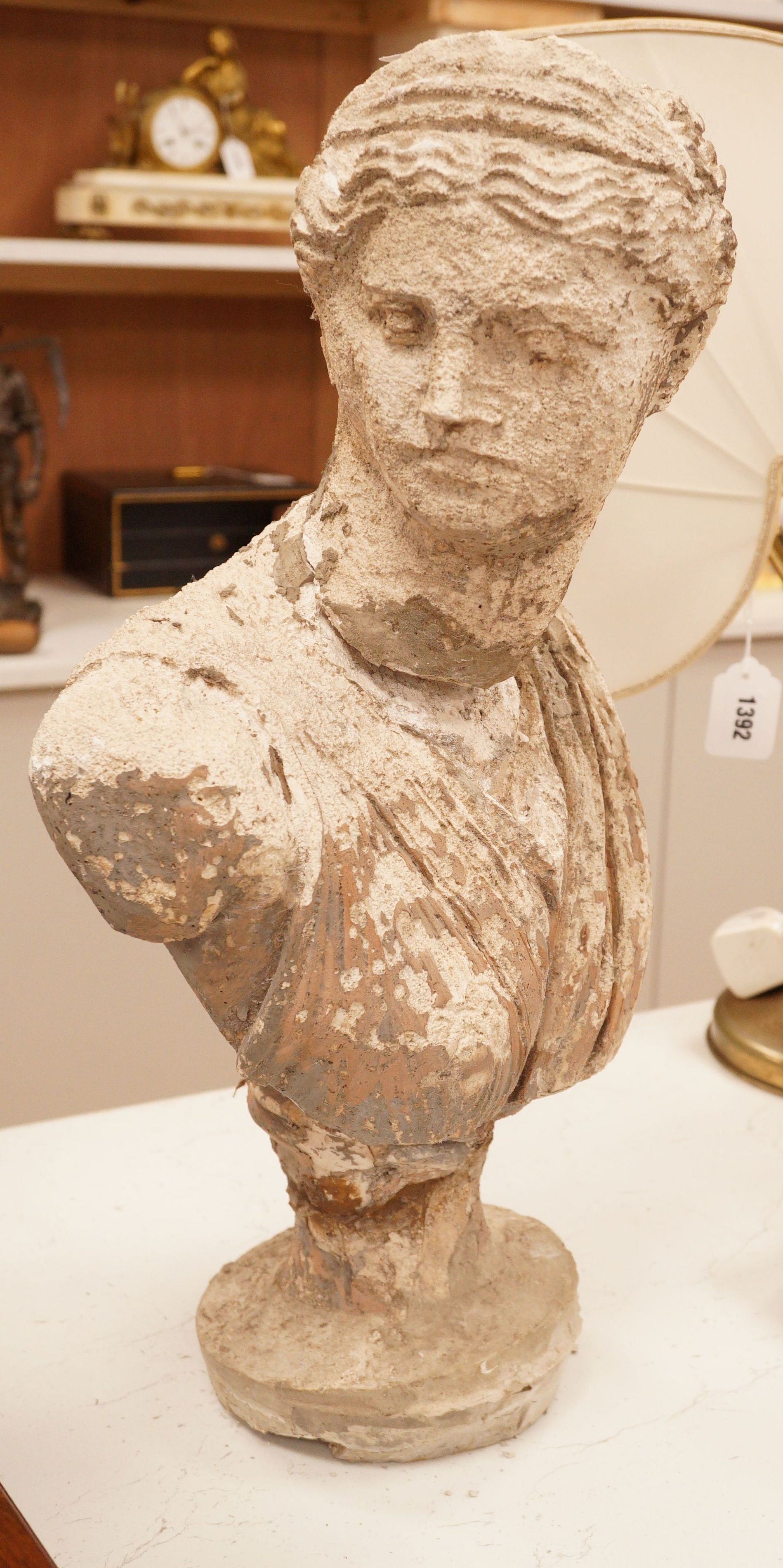 A reconstituted bust of a classical figure, 54cm tall